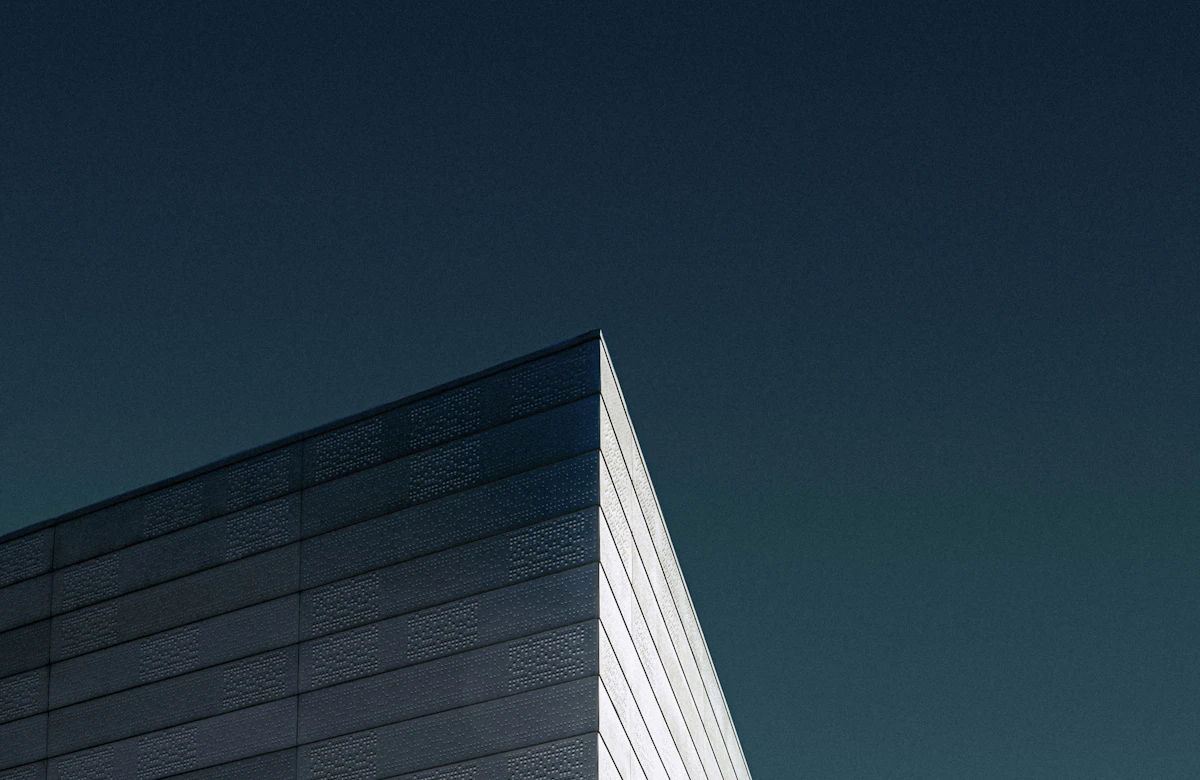 White architectural planes against a blue sky, an illustrative photograph